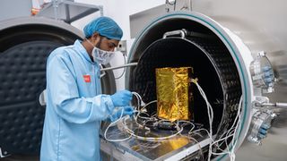 A technician works on the lander for the Emirates Mission to the Asteroid Belt, which is scheduled to launch in March 2028.