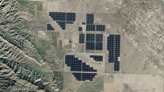 The Topaz Solar Farm in California, which covers 9.5 square miles (25.6 square kilometers), as seen from space.