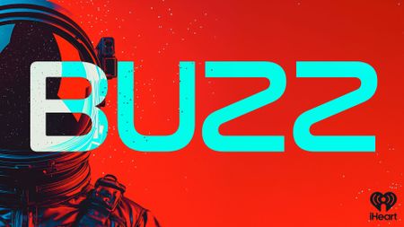 a silhouette of a spacesuit with the word "BUZZ" against a red backdrop