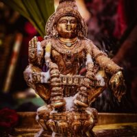 Image of the revered Hindu deity Ayyappan depicted in traditional idol form.