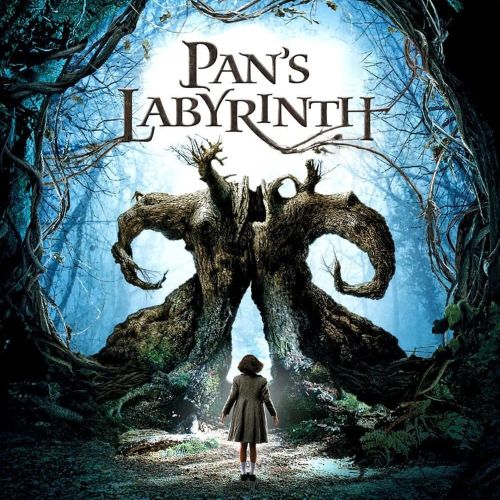 Movie poster of Pan’s Labyrinth showing Ofelia entering a mystical labyrinth