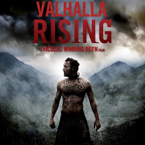 Cover image of Valhalla Rising (2009), featuring a lone warrior standing against a stormy, desolate landscape with a brooding sky.