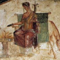 Vesta depicted in radiant art as the goddess of hearth and home, symbolizing warmth, protection, and sacred fire.